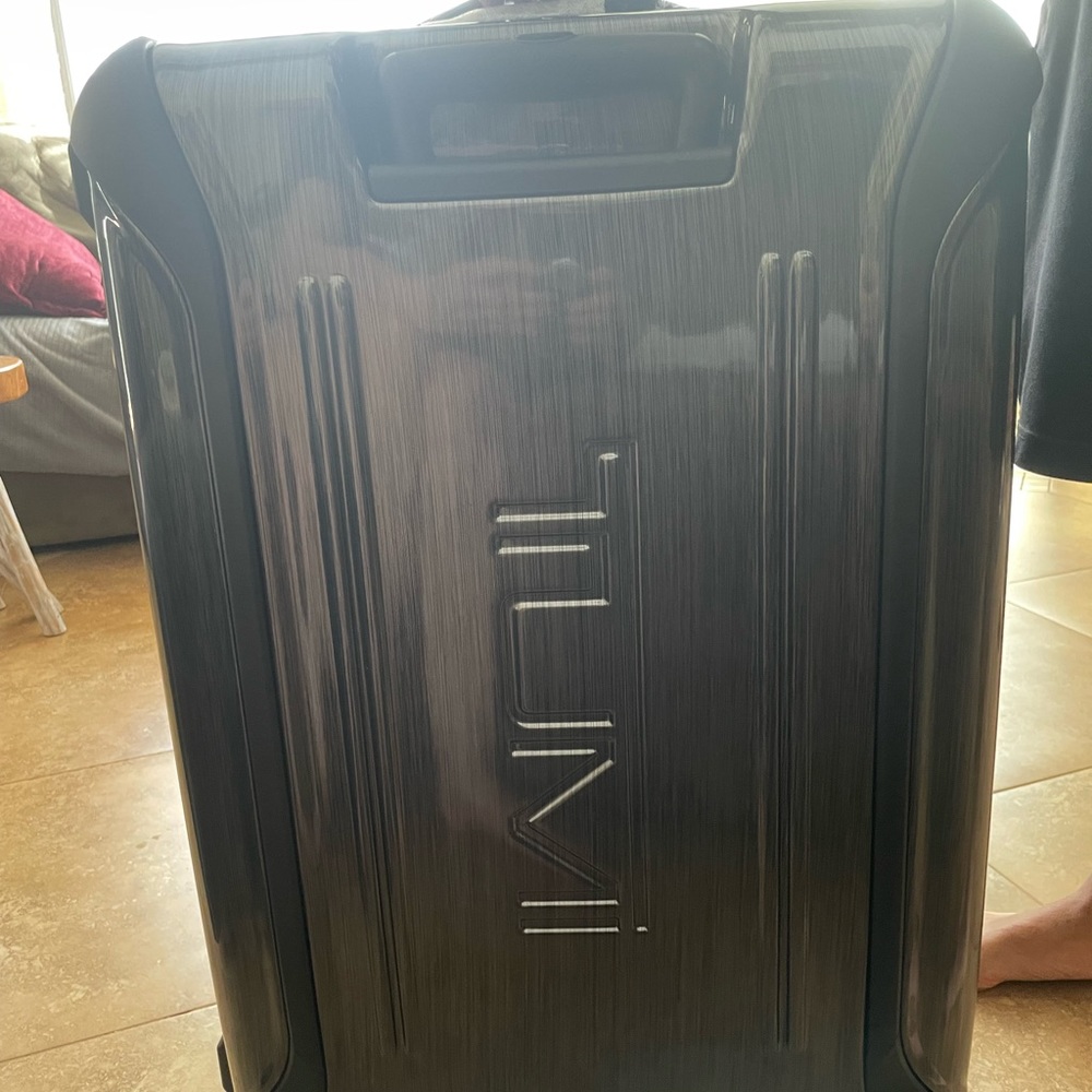 Tumi suitcase - the measurements: 28” High x 18” wide x 11” deep